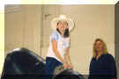 Me on the bull with Mama Loni looking on.