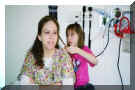 Me doing nurse Jennifer's hair.  I love to fix hair, especially when it's long.