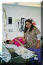 Jennifer helping me get ready for treatment.