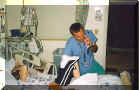 Me with nurse John- who Pinky the fish is attacking.