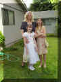 This is a very nice picture of me and my sister and my Mama Loni all ready for church.