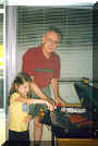 Rachel and Grandpa Darel at the grill.
